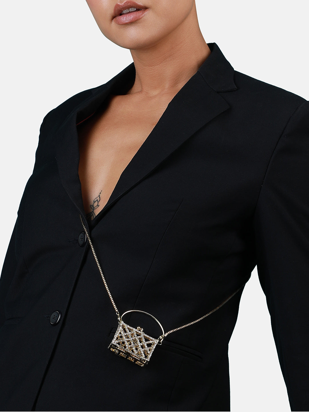 The Golden Duo: Unleashing Glamour With A Metallic Bodychain & Mini Purse