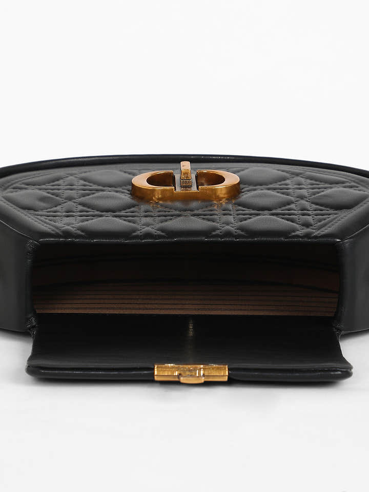 The Quilted Curve Sling Bag - Midnight Black