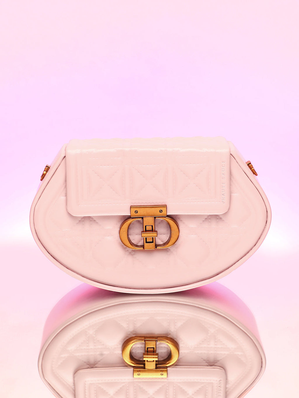 The Quilted Curve Sling Bag - Nude Pink