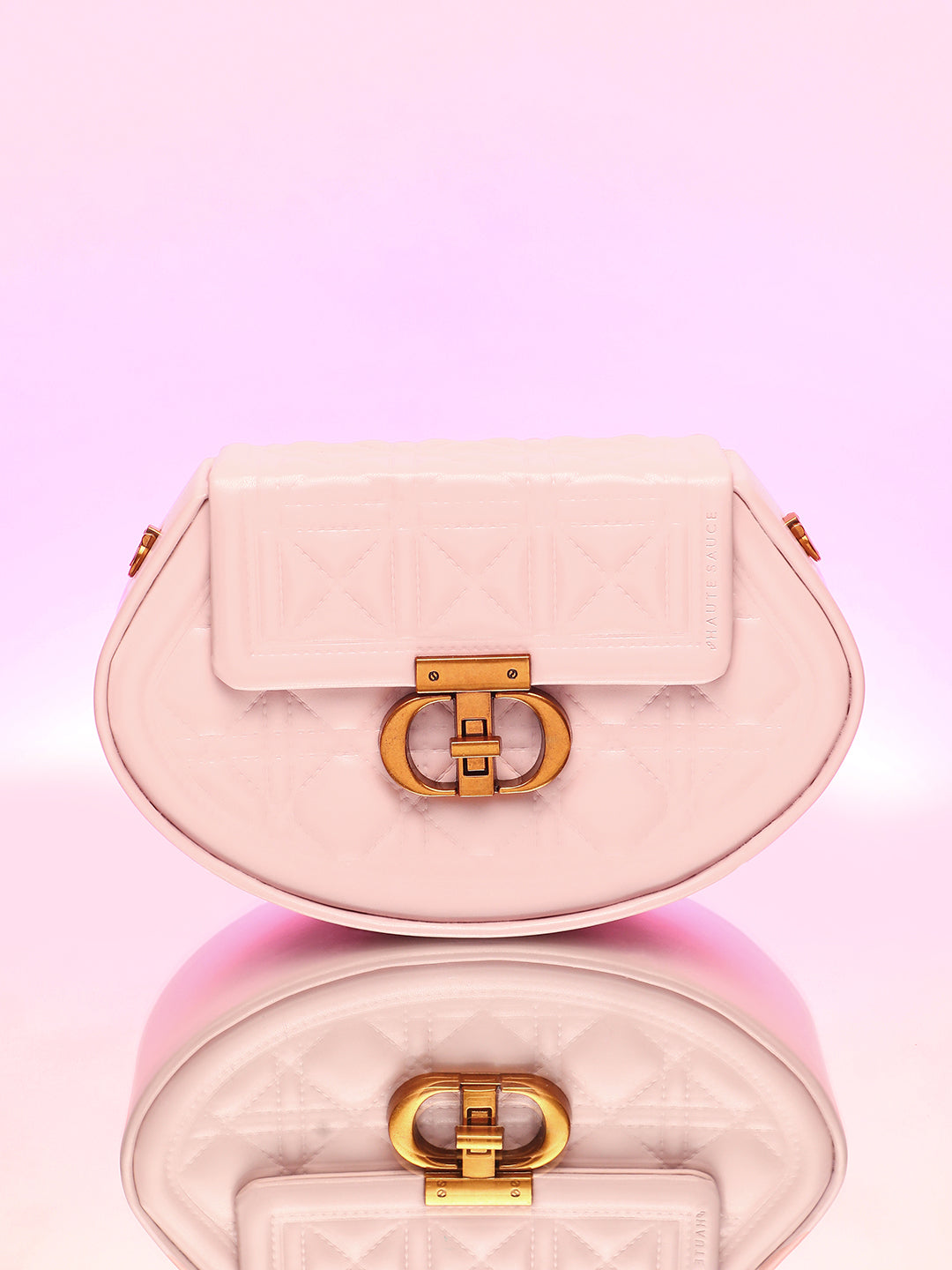 The Quilted Curve Sling Bag - Nude Pink