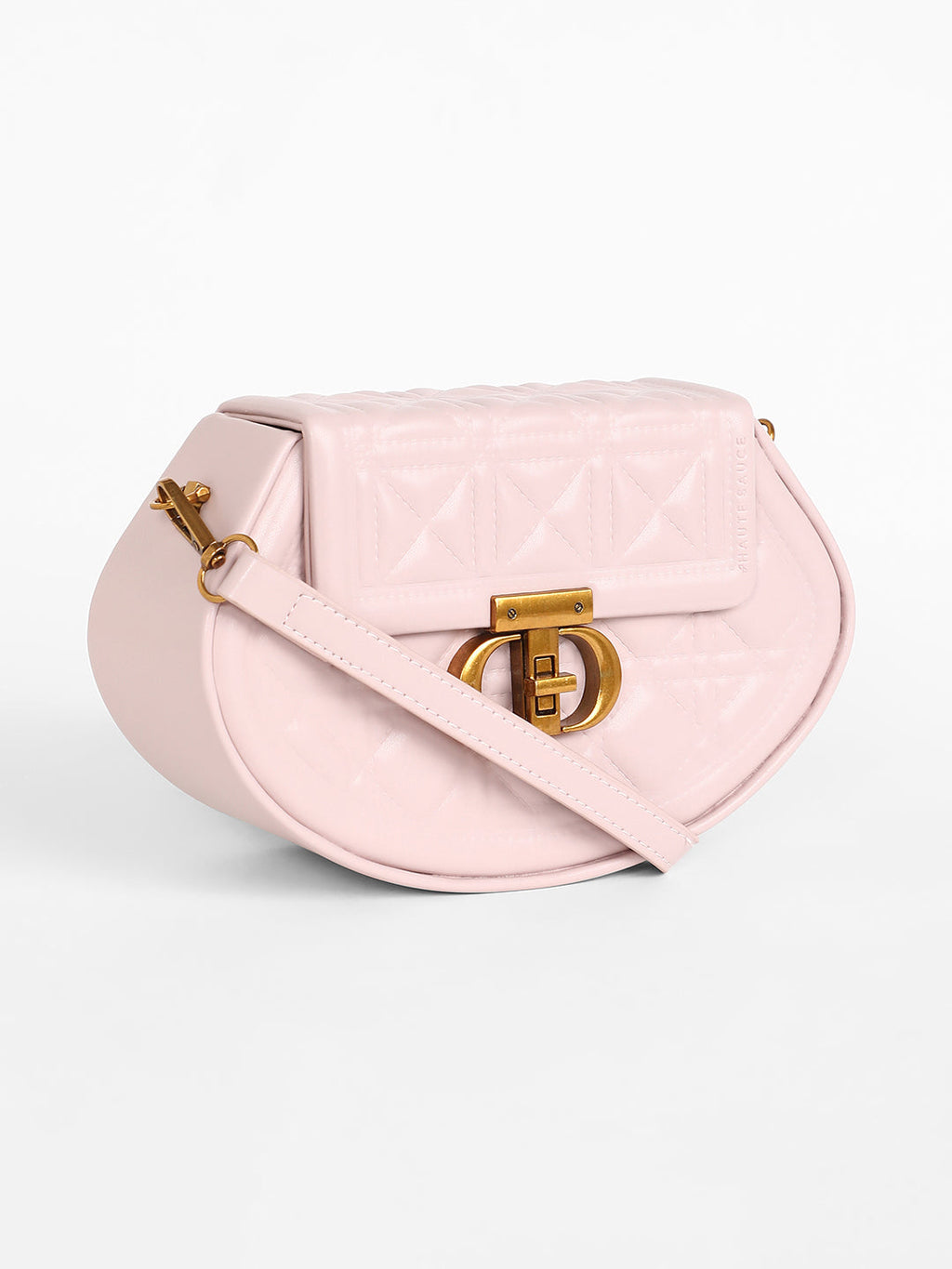The Quilted Curve Sling Bag - Nude Pink