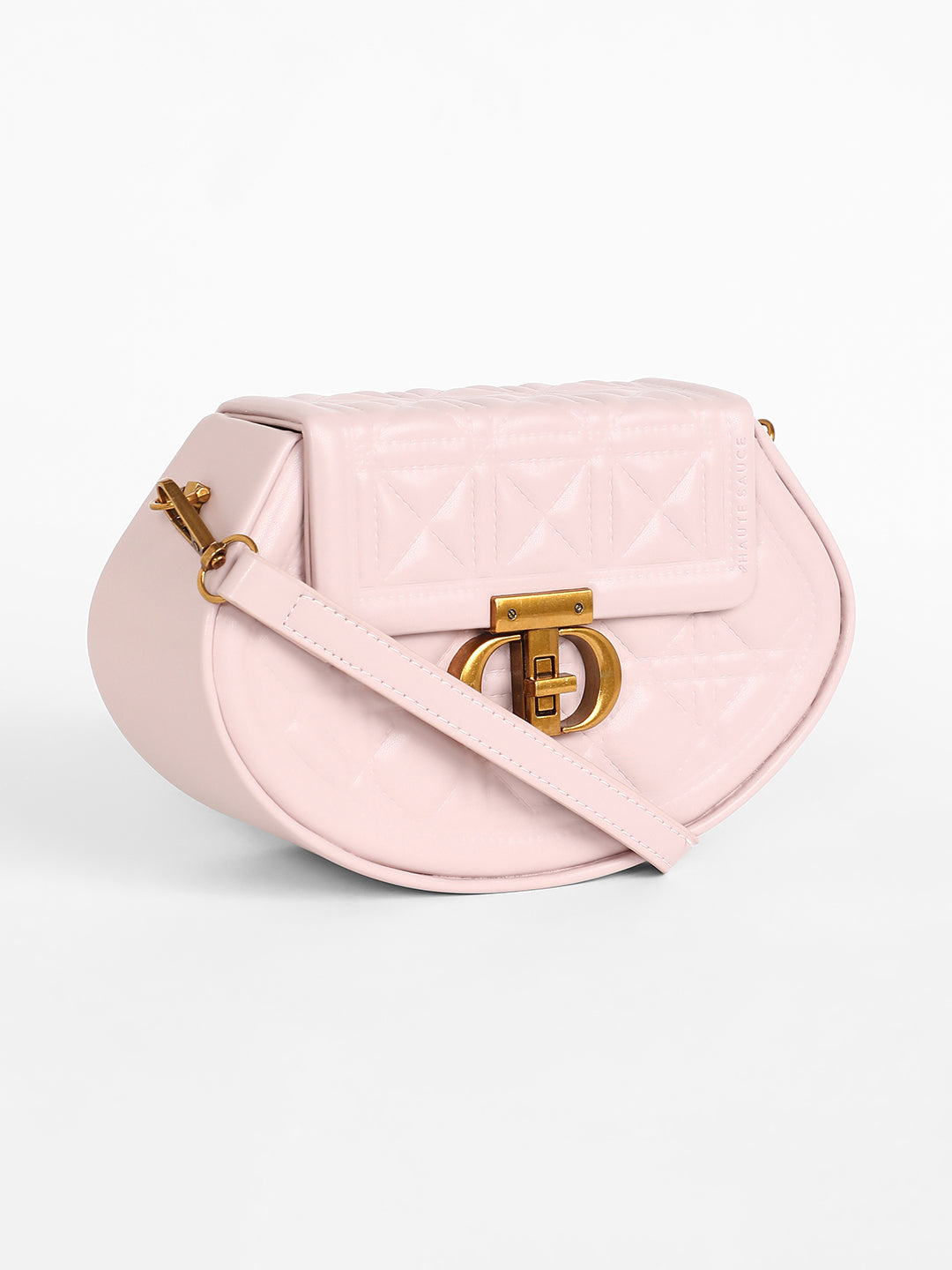 The Quilted Curve Sling Bag - Nude Pink