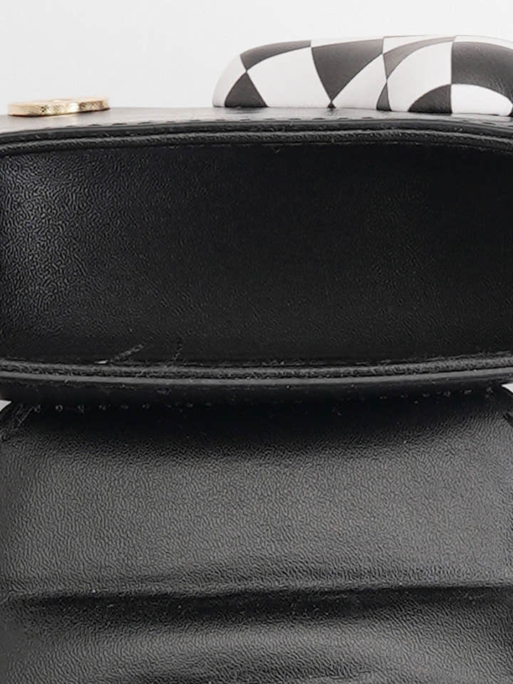 The Micro Pillow Heart Sling Bag - Onyx Black