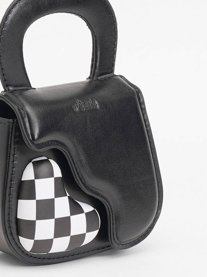 The Micro Pillow Heart Sling Bag - Onyx Black
