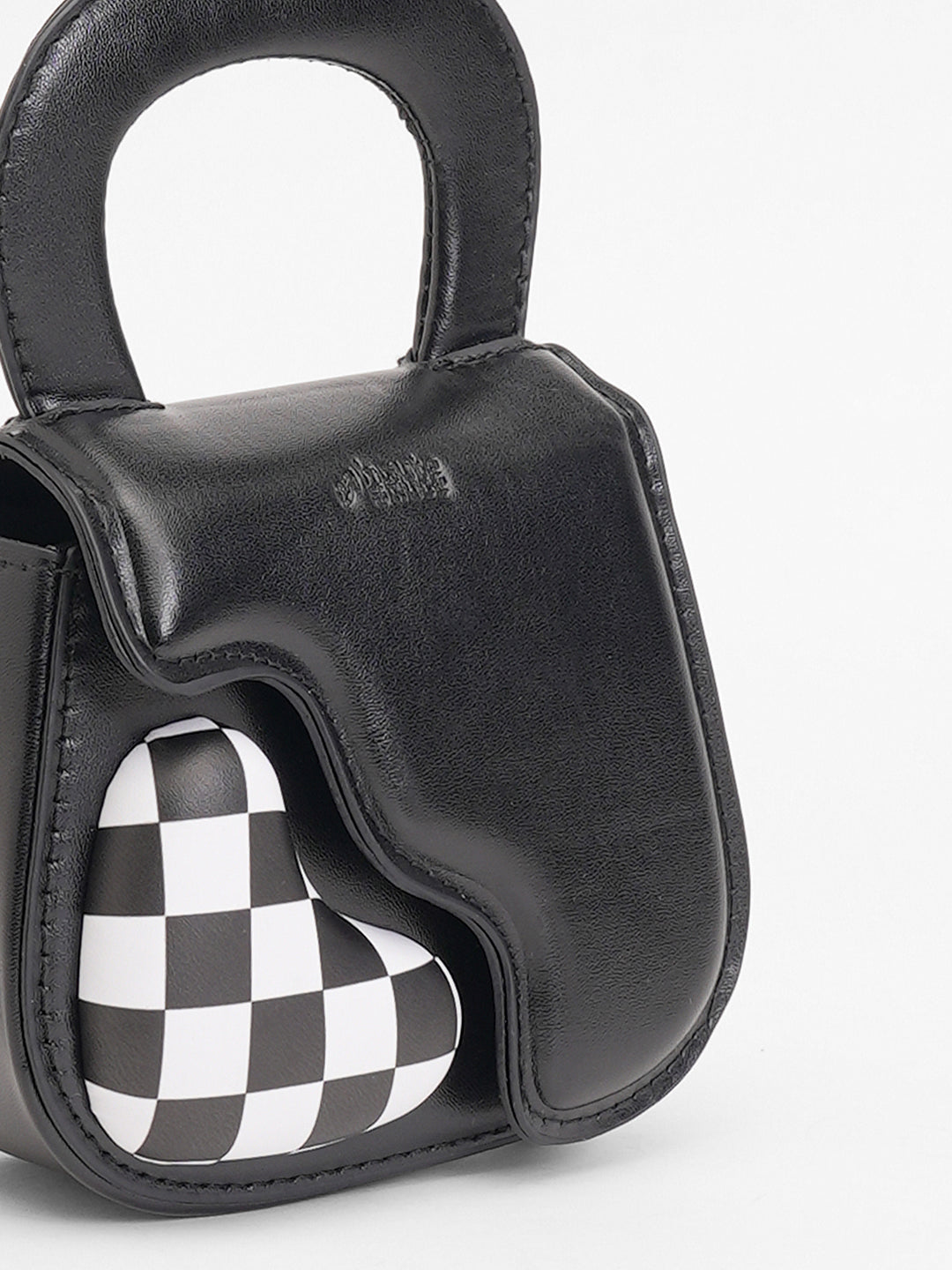 The Micro Pillow Heart Sling Bag - Onyx Black