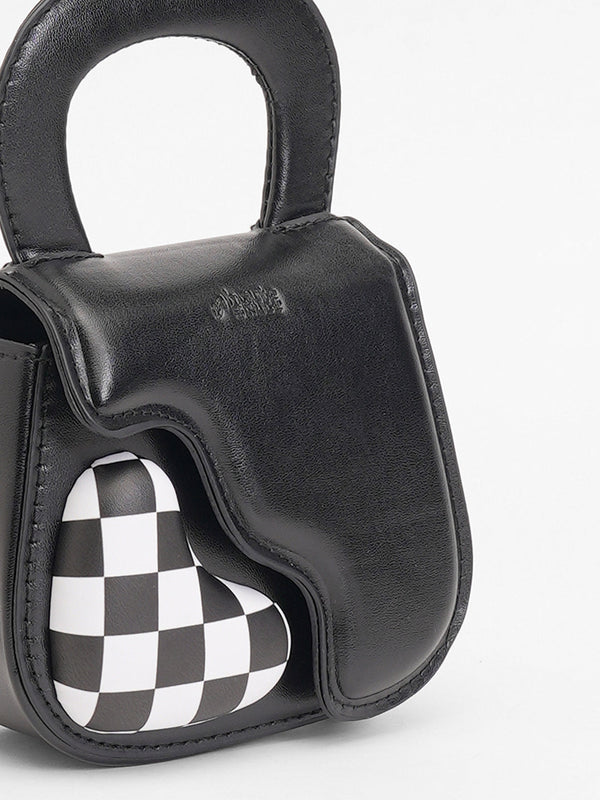 The Micro Pillow Heart Sling Bag - Onyx Black