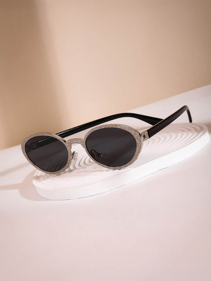 The Dented Oval Sunglass - Metallic Silver