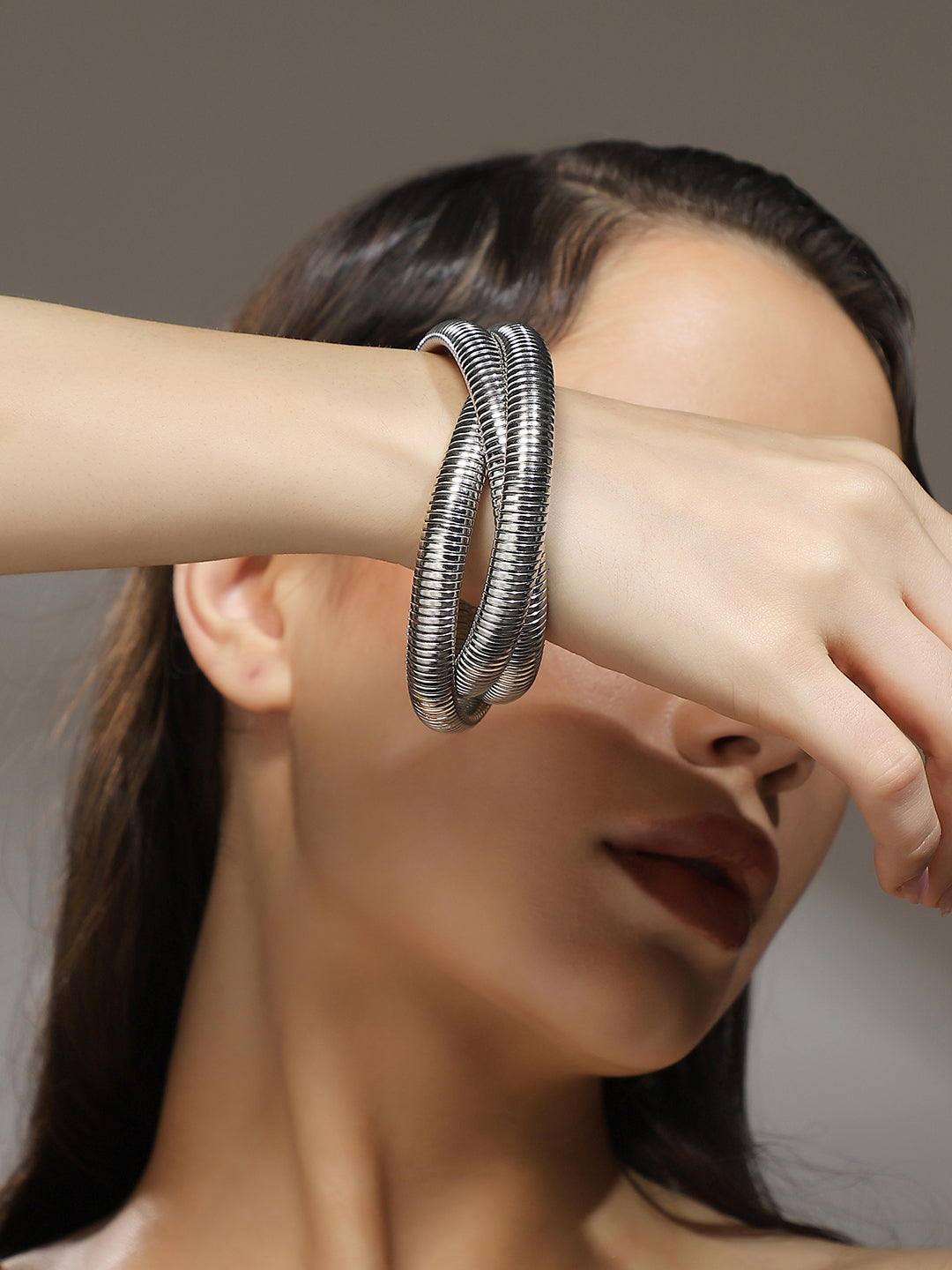 The Snake-Ribbed Bangle Bracelet - Metallic Silver