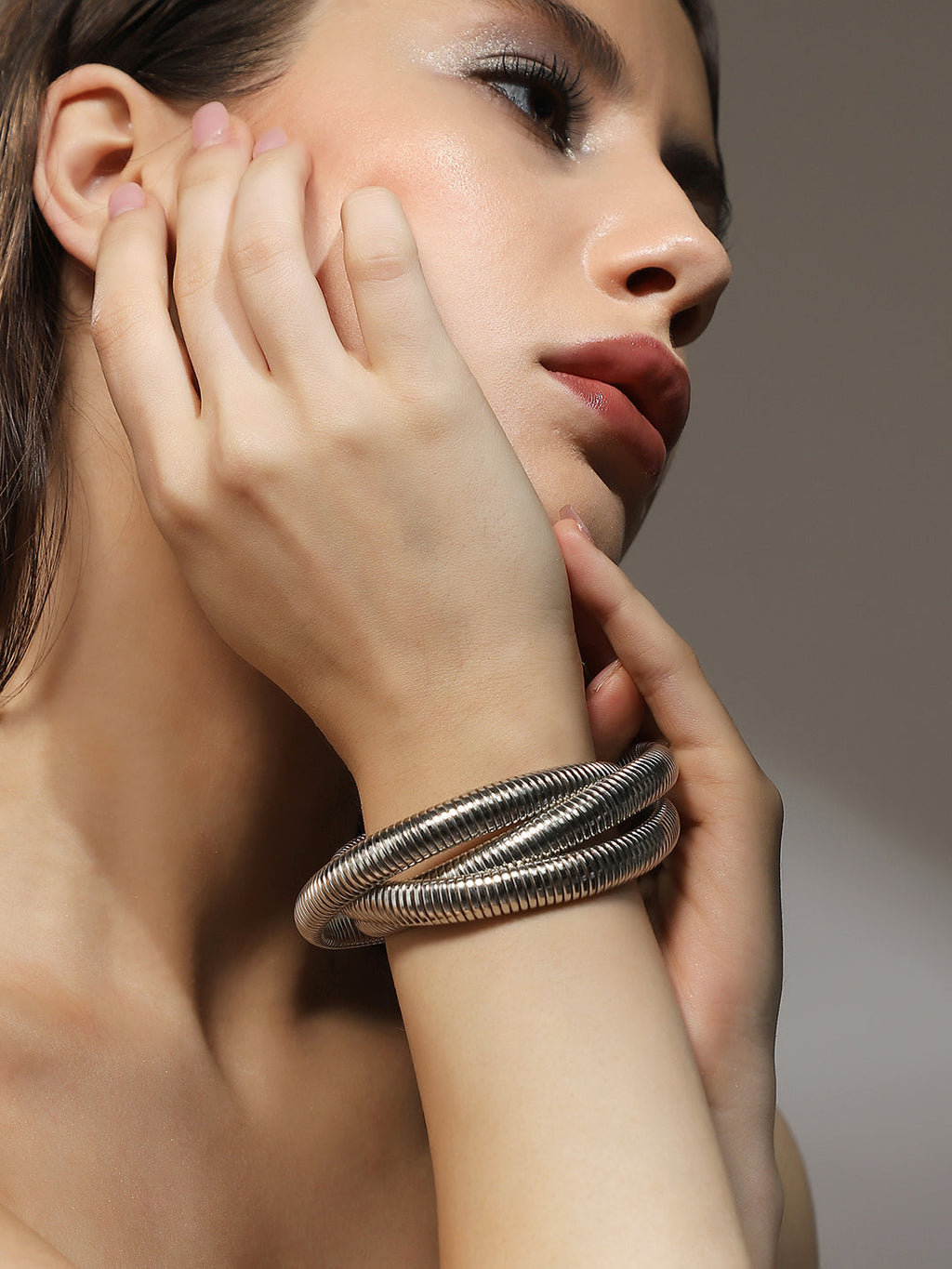 The Snake-Ribbed Bangle Bracelet - Metallic Silver