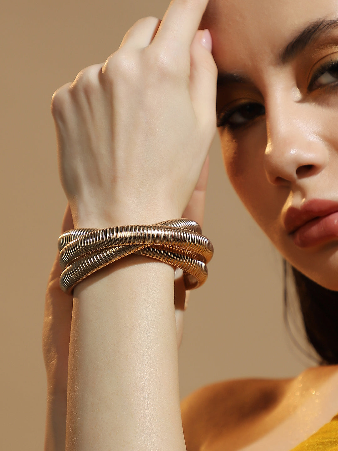 The Snake-Ribbed Bangle Bracelet - California Gold