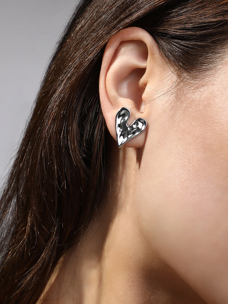 The Dented-Coeur Stud Earrings - Metallic Silver