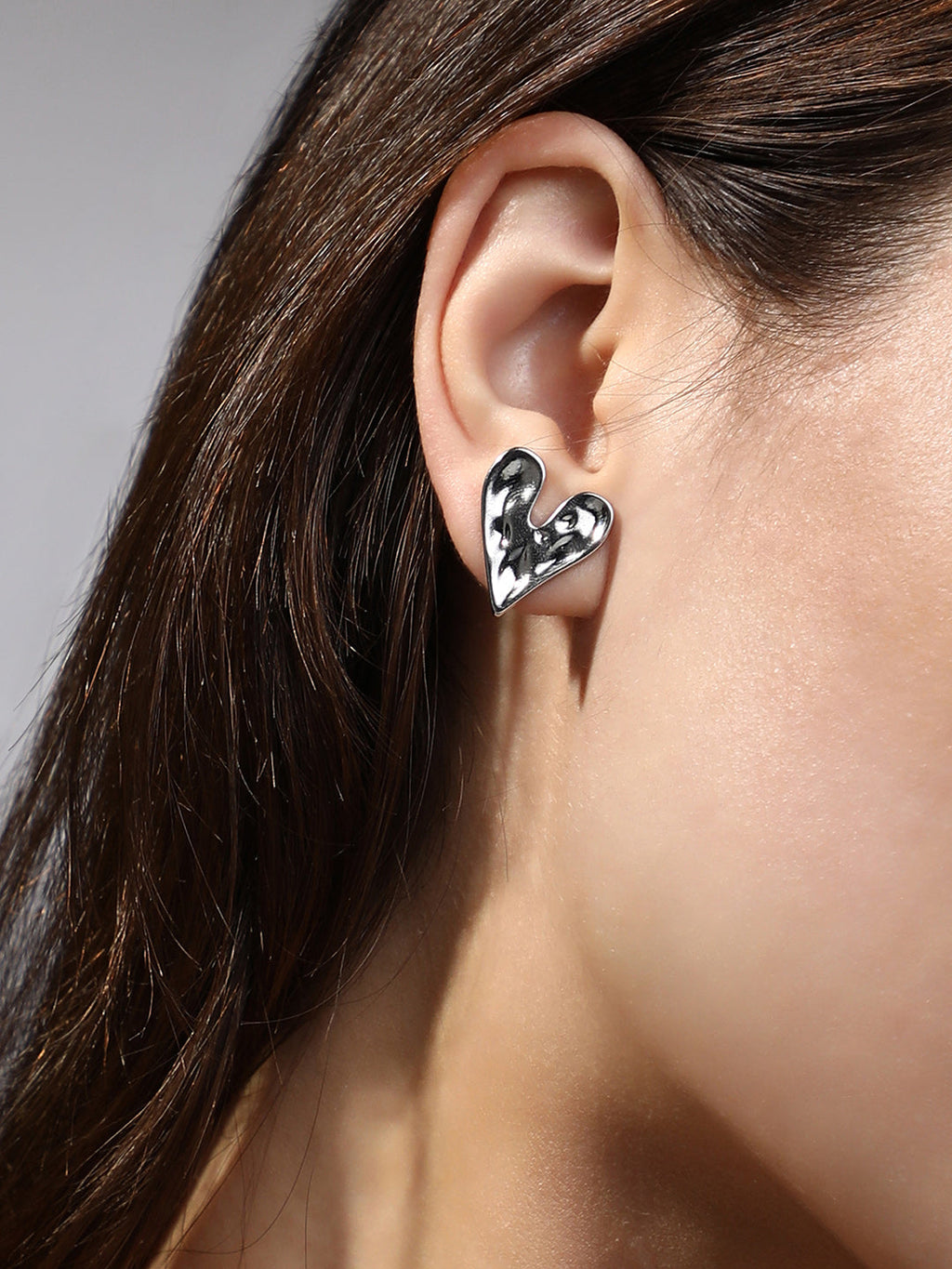 The Dented-Coeur Stud Earrings - Metallic Silver