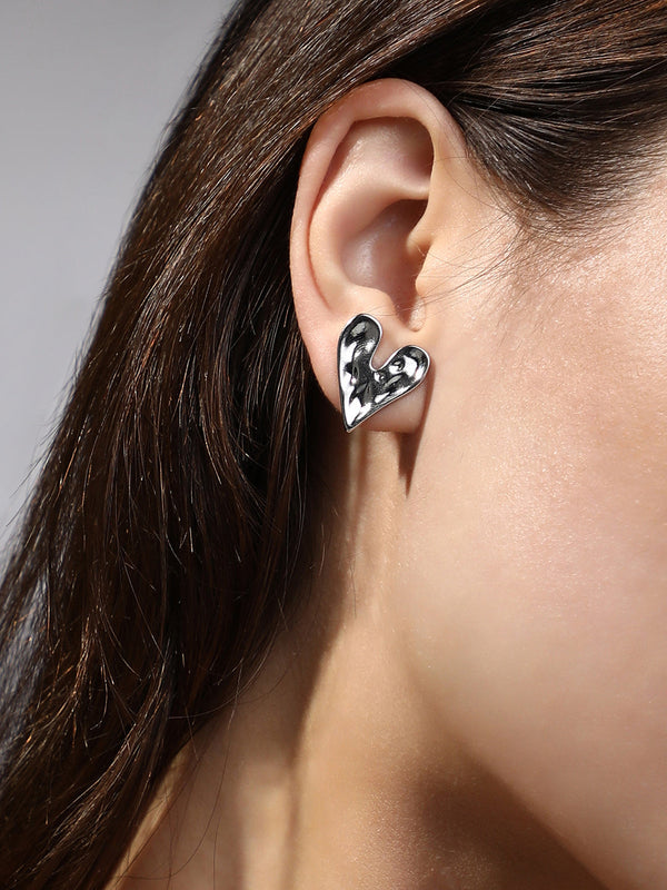 The Dented-Coeur Stud Earrings - Metallic Silver