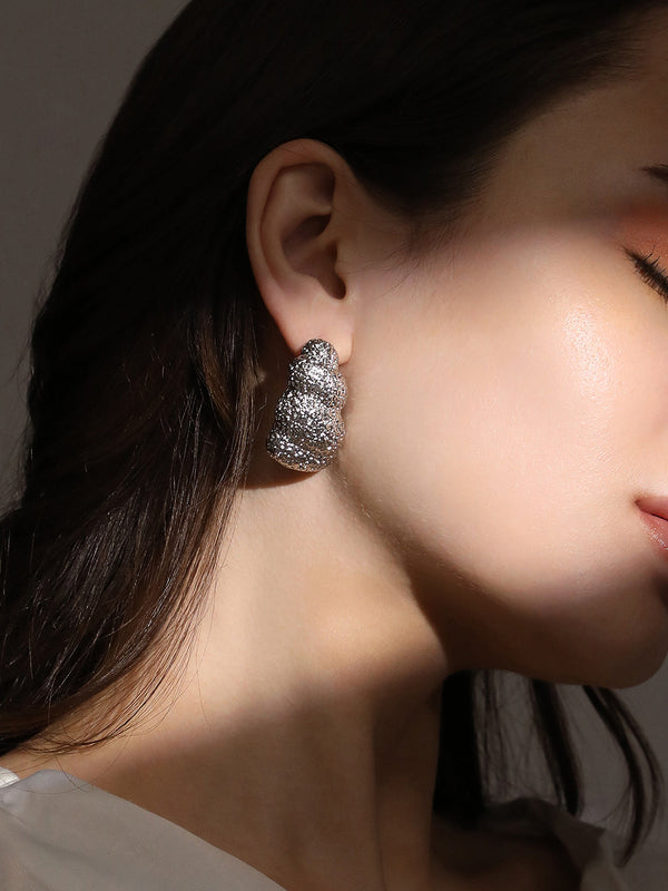 The Dented-Swirl Hoop Earrings - Metallic Silver