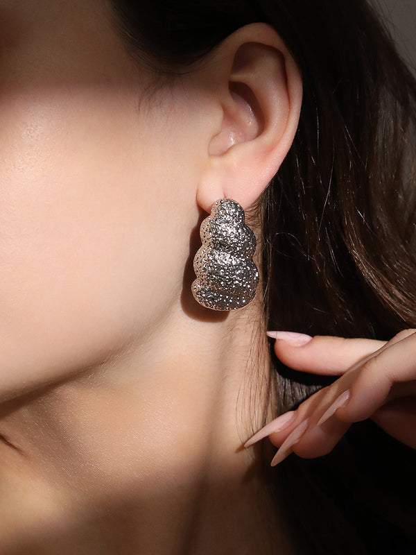 The Dented-Swirl Hoop Earrings - Metallic Silver