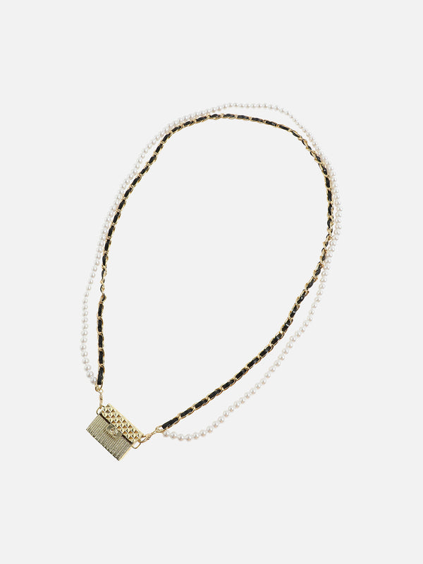 Glimmering Essentials: The Metallic Bodychain & Mini Purse Combo