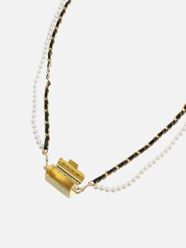 Glimmering Essentials: The Metallic Bodychain & Mini Purse Combo