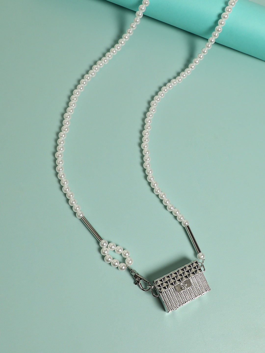 Dazzling Allure: Adorning With A Metallic Bodychain & Mini Purse