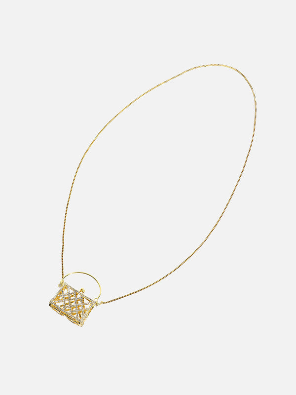 The Golden Duo: Unleashing Glamour With A Metallic Bodychain & Mini Purse